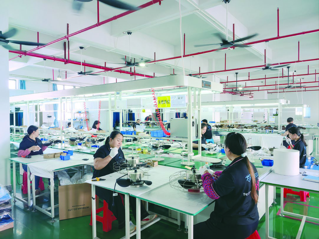 ECO Fans workers assembling ceiling fans on the factory floor